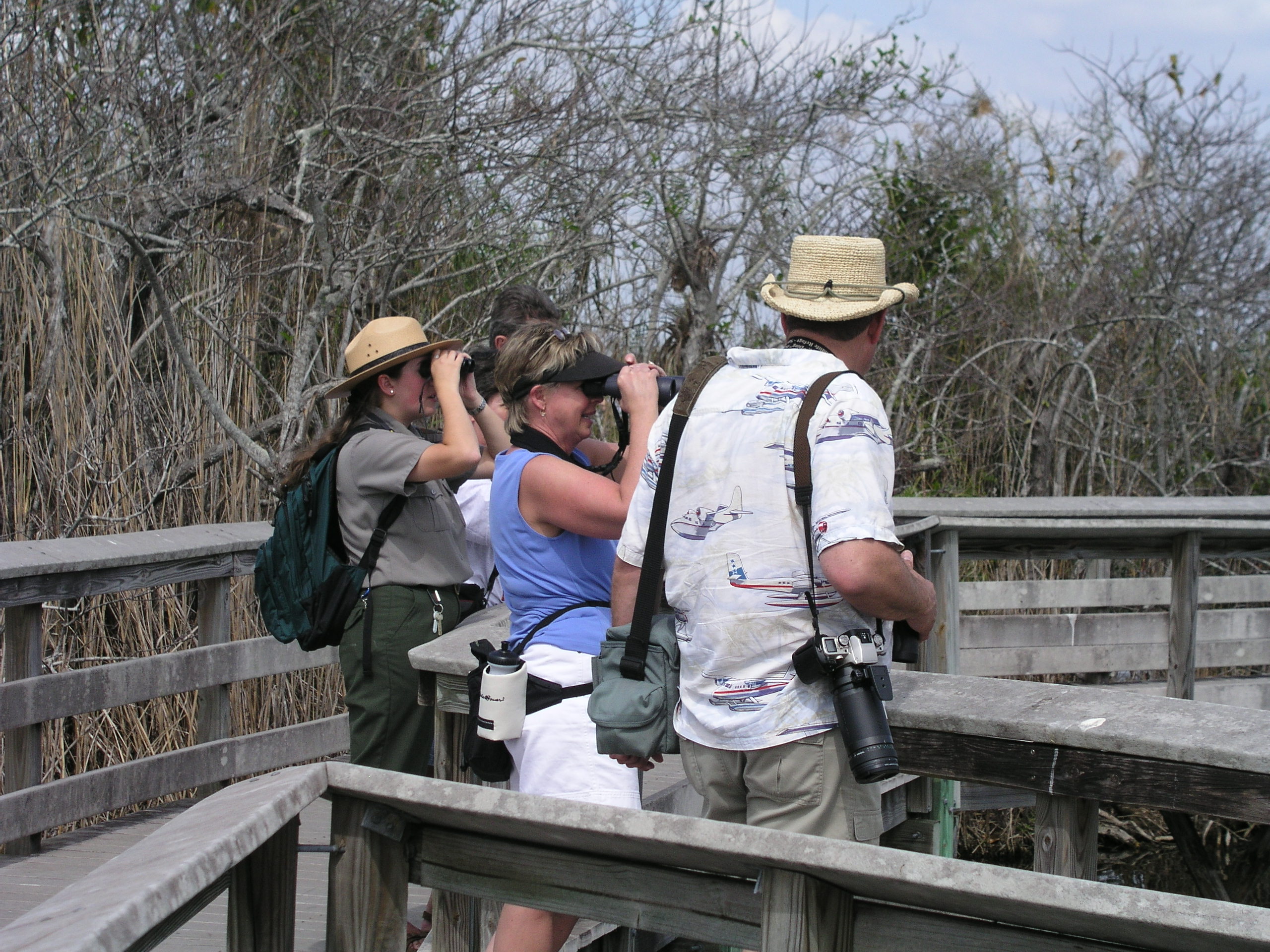 A Ranger Removes His Hat, Revealing Another Hat